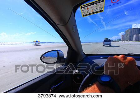Picture - USA, Florida, Daytona Beach. Car on the beach.. Fotosearch