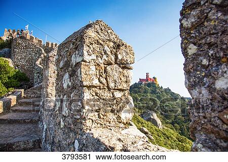 View of Pena National Palace, through the wall of the Moorish Castle, Sintra, Lisbon area, Portugal. View Large Photo Image Stock Image - View of Pena National Palace, through the wall of the Moorish Castle, Sintra, Lisbon area, Portugal.. Fotosearch