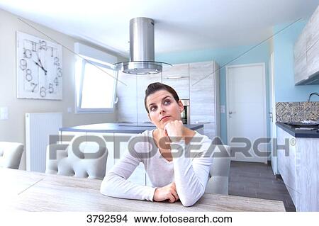 Woman in her cooking room. View Large Photo Image Picture - Woman in her cooking room.. Fotosearch