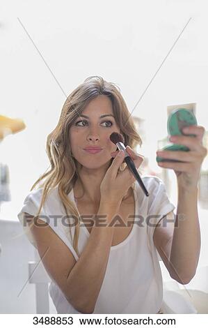 Woman with make-up in a Cafe View Large Photo Image Stock Image - Woman with make-up in a Cafe. Fotosearch