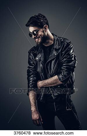 Young Hipster leather jacket, smiled, her head on the side View Large Photo Image Stock Photo - Young Hipster leather jacket, smiled, her head on the side. Fotosearch