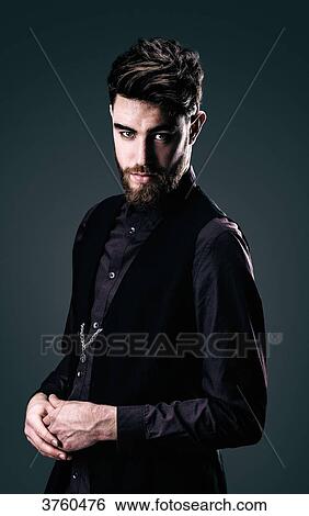 Young Hipster shirt and jacket looking at the camera View Large Photo Image Stock Photograph - Young Hipster shirt and jacket looking at the camera. Fotosearch