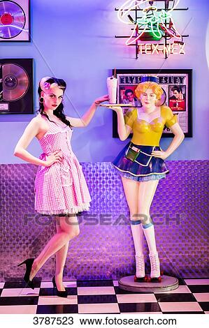 Young Pin Up, taking a milkshake on the set of a waitress View Large Photo Image Stock Image - Young Pin Up, taking a milkshake on the set of a waitress. Fotosearch