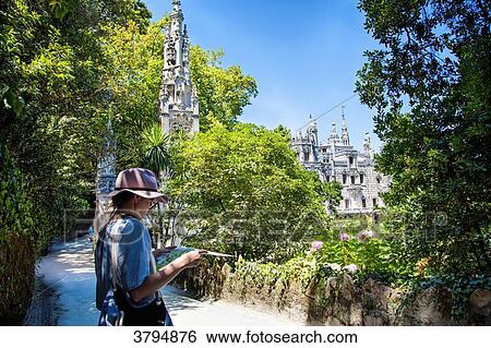 Young woman in profile looking at a map in the garden Pena, Sintra, Lisbon area, Portugal View Large Photo Image Stock Photograph - Young woman in profile looking at a map in the garden Pena, Sintra, Lisbon area, Portugal. Fotosearch