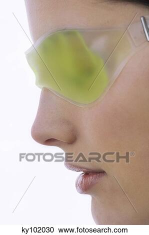 Woman with a gel eye mask, close up (studio) View Large Photo Image Stock Image - Woman with a gel eye mask, close up (studio). Fotosearch