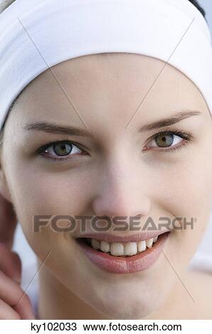 Woman with headband, close up (studio) View Large Photo Image Stock Image - Woman with headband, close up (studio). Fotosearch