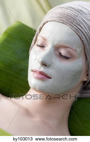Young Woman face with beauty mask, shut eyes View Large Photo Image Stock Image - Young Woman face with beauty mask, shut eyes. Fotosearch