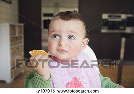 Baby eating, interior View Large Photo Image Stock Photography - Baby eating, interior. Fotosearch