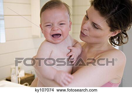 Mother and baby crying View Large Photo Image Picture - Mother and baby crying. Fotosearch