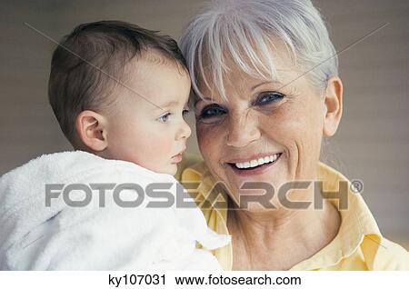 Portrait of grand mother and baby View Large Photo Image Stock Image - Portrait of grand mother and baby. Fotosearch