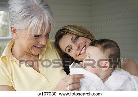 Stock Image - Portrait of grand mother, mother and baby. Fotosearch