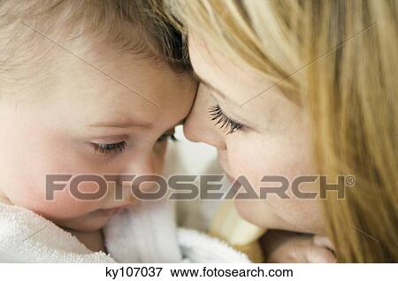 Portrait of mother and baby View Large Photo Image Stock Photo - Portrait of mother and baby. Fotosearch