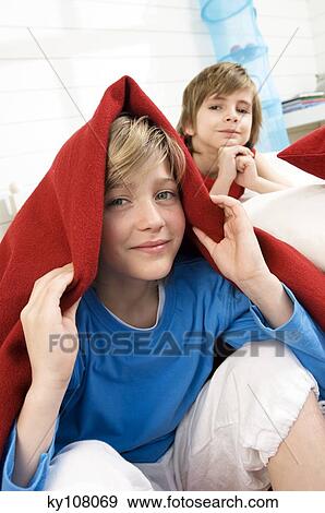 2 boys at home View Large Photo Image Stock Photo - 2 boys at home. Fotosearch