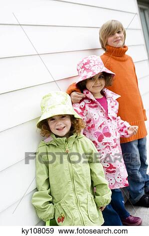3 children outdoors View Large Photo Image Stock Photo - 3 children outdoors. Fotosearch