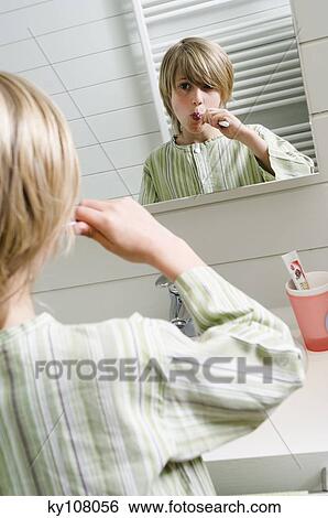Boy brushing his teeth View Large Photo Image Stock Photograph - Boy brushing his teeth. Fotosearch