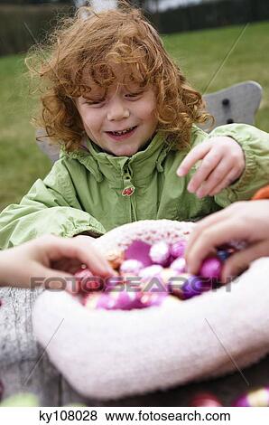 Children with Easter eggs View Large Photo Image Stock Photo - Children with Easter eggs. Fotosearch