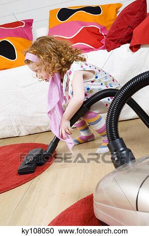 Littel girl with vacuum cleaner View Large Photo Image Stock Image - Littel girl with vacuum cleaner. Fotosearch