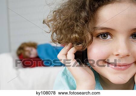 Portrait of a little girl View Large Photo Image Stock Photo - Portrait of a little girl. Fotosearch
