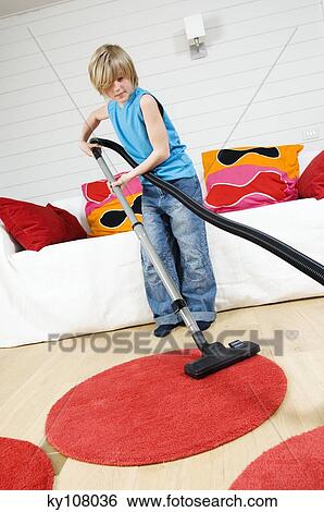 Young boy with vacuum cleaner View Large Photo Image Stock Photograph - Young boy with vacuum cleaner. Fotosearch