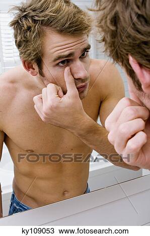 Barechested man in front of bathroom mirror View Large Photo Image Stock Image - Barechested man in front of bathroom mirror. Fotosearch