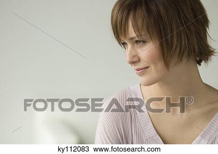 Portrait of a young thinking woman View Large Photo Image Stock Image - Portrait of a young thinking woman. Fotosearch