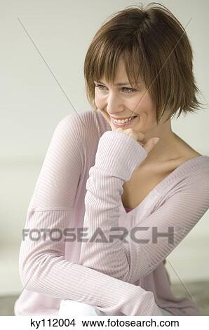 Picture - Young smiling woman. Fotosearch