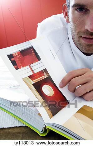 Man reading a book, close-up View Large Photo Image Stock Image - Man reading a book, close-up. Fotosearch