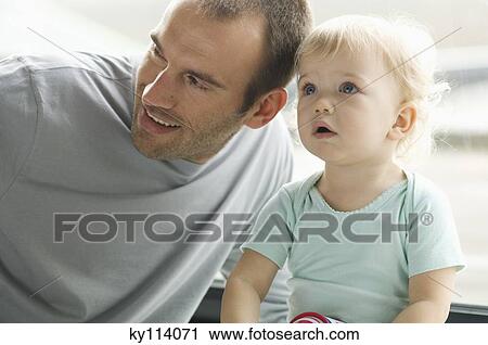 Portrait of man and little boy View Large Photo Image Stock Image - Portrait of man and little boy. Fotosearch