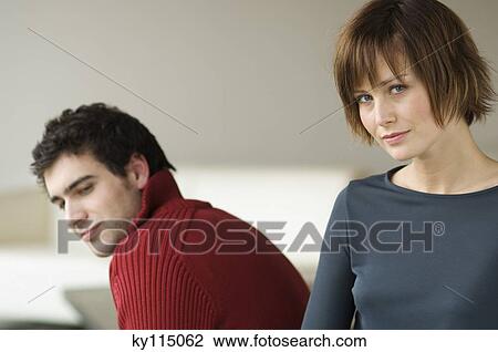 Stock Image - Couple in a living-room. Fotosearch