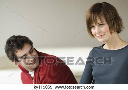 Couple in a living-room View Large Photo Image Stock Photography - Couple in a living-room. Fotosearch