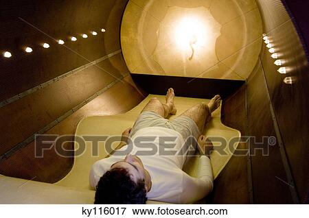 Man resting in a relaxation box View Large Photo Image Stock Photo - Man resting in a relaxation box. Fotosearch