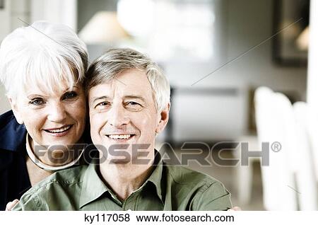 Stock Photo - Portrait of a senior couple smiling for the camera. Fotosearch