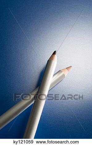 Stock Photo - 2 eye-liner pencils, close-up. Fotosearch