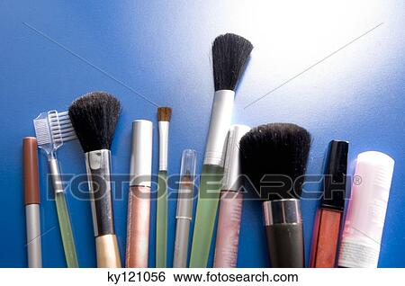 Stock Photograph - Make-up pencils and brushes, close-up. Fotosearch