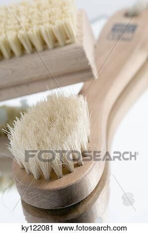 Stock Image - Bath and nail brushes, close-up. Fotosearch