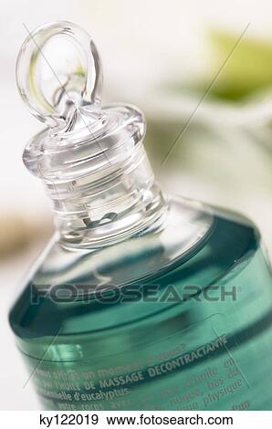 Essential oil bottle, close-up View Large Photo Image Stock Photo - Essential oil bottle, close-up. Fotosearch