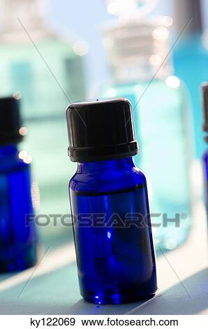 Essential oil bottles, close-up View Large Photo Image Stock Photo - Essential oil bottles, close-up. Fotosearch