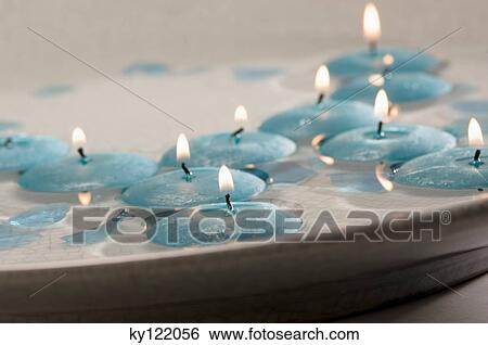 Floating candles, close-up View Large Photo Image Stock Photograph - Floating candles, close-up. Fotosearch