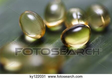 Omega 3 capsules, close-up View Large Photo Image Stock Image - Omega 3 capsules, close-up. Fotosearch
