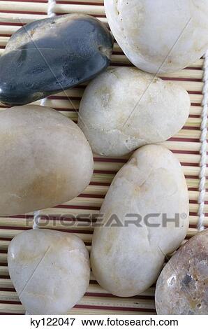 Stock Photo - Peebles, close-up. Fotosearch