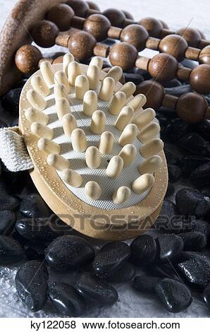 Wooden massagers and peebles, close-up View Large Photo Image Stock Photo - Wooden massagers and peebles, close-up. Fotosearch