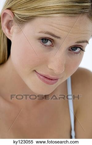 Portrait of young woman frowning View Large Photo Image Stock Photography - Portrait of young woman frowning. Fotosearch