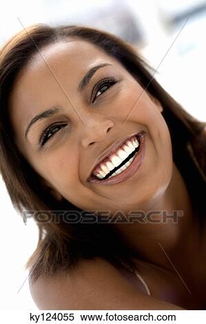 Stock Photography - Portrait of a young smiling woman. Fotosearch