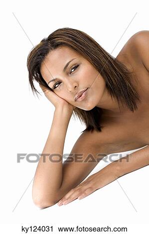 Young woman resting her head on her hand View Large Photo Image Stock Image - Young woman resting her head on her hand. Fotosearch