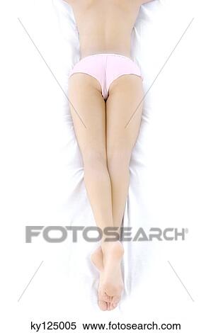 Young woman in underwear, lying on front View Large Photo Image Stock Photography - Young woman in underwear, lying on front. Fotosearch