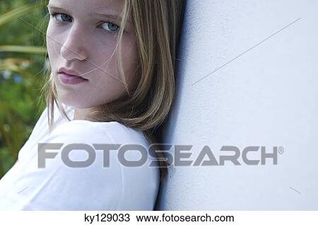 Portrait of a sulking teenage girl View Large Photo Image Stock Image - Portrait of a sulking teenage girl. Fotosearch