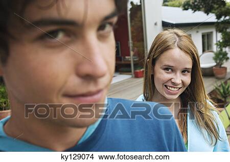 Portrait of teenage boy and girl View Large Photo Image Picture - Portrait of teenage boy and girl. Fotosearch