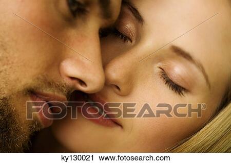 Portrait of a young couple in love, eyes closed View Large Photo Image Stock Image - Portrait of a young couple in love, eyes closed. Fotosearch