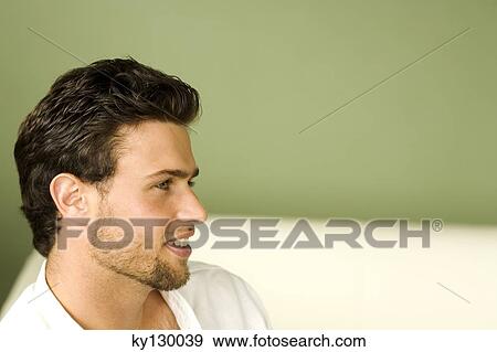 Portrait of a young man, view in profile View Large Photo Image Stock Photo - Portrait of a young man, view in profile. Fotosearch