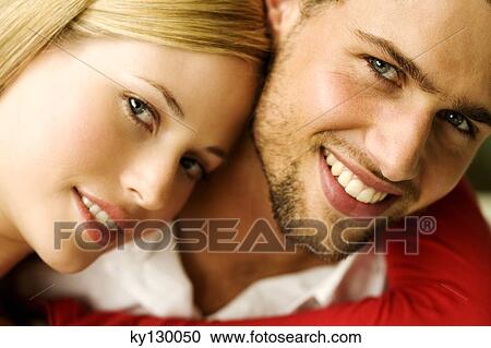 Portrait of a young smiling couple View Large Photo Image Stock Image - Portrait of a young smiling couple. Fotosearch
